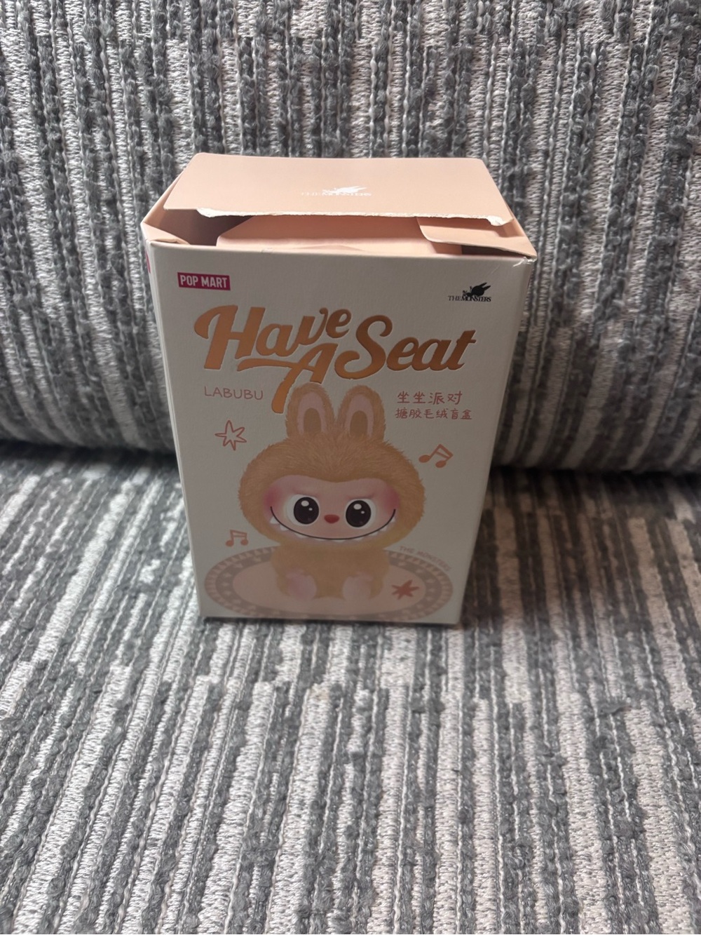 Pop Mart Have A Seat Labubu Figure in Cream and Pink